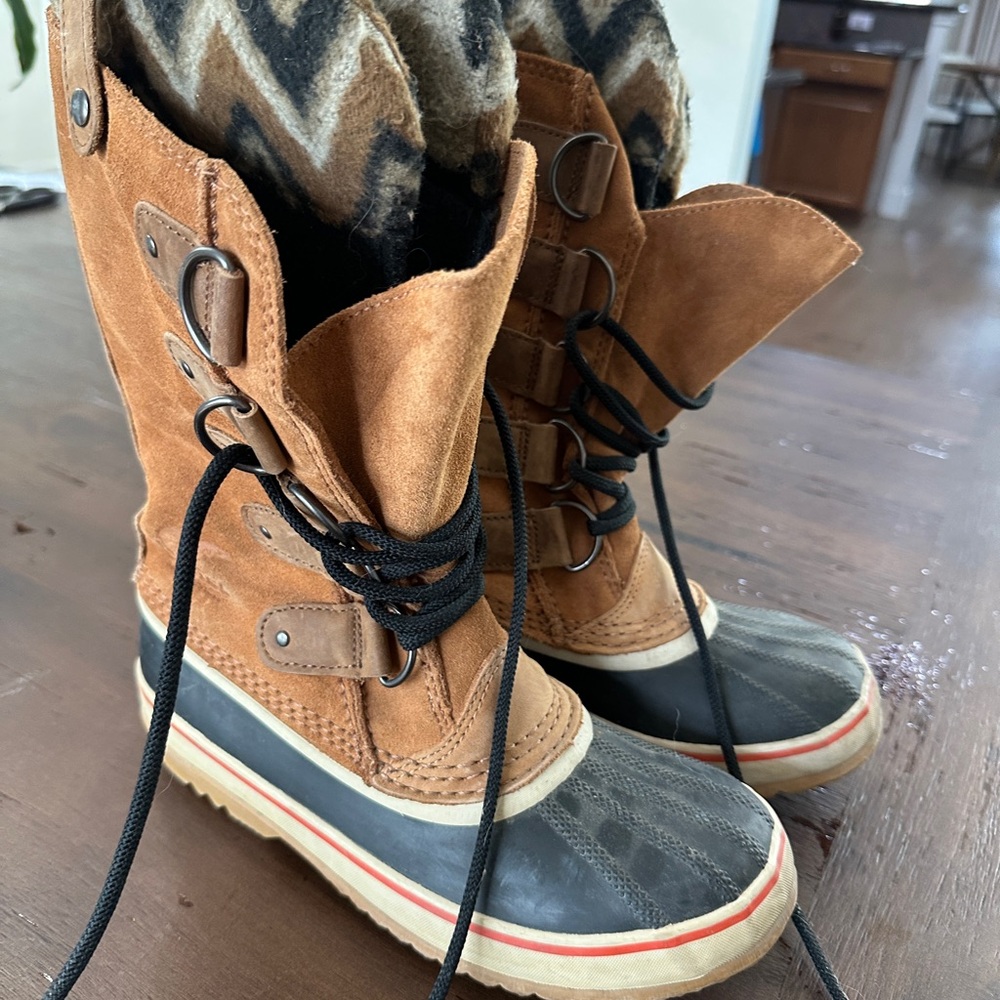 Sorel Tan and Black Winter Boots